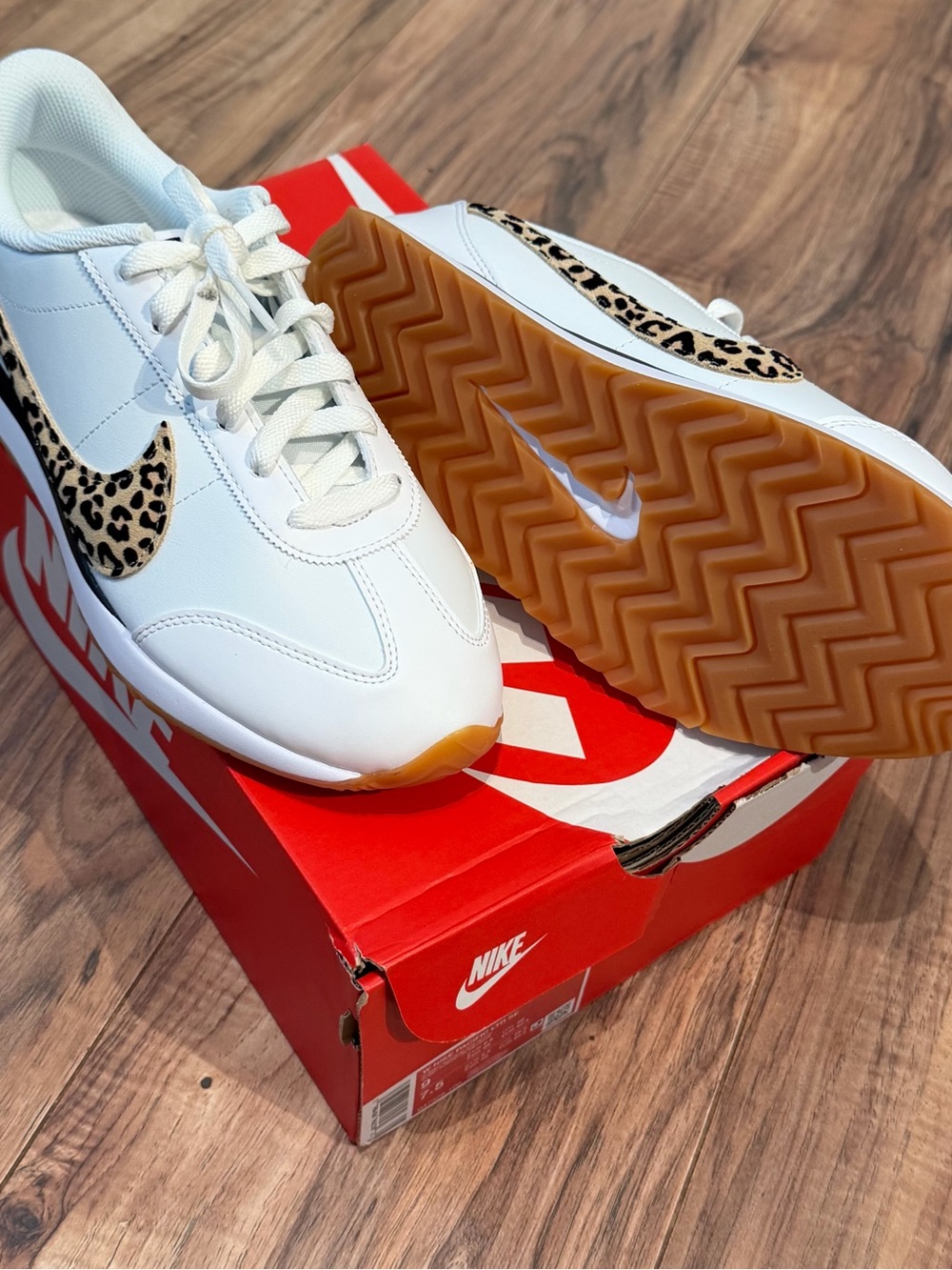 Nike Women’s White Sneakers with Leopard Swoosh and Gum Sole